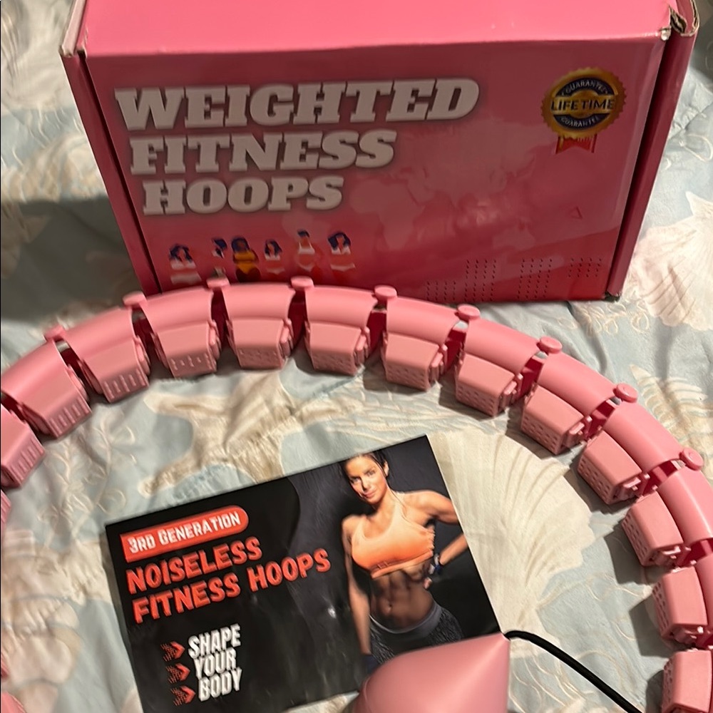 Weighted fitness hoop with counter